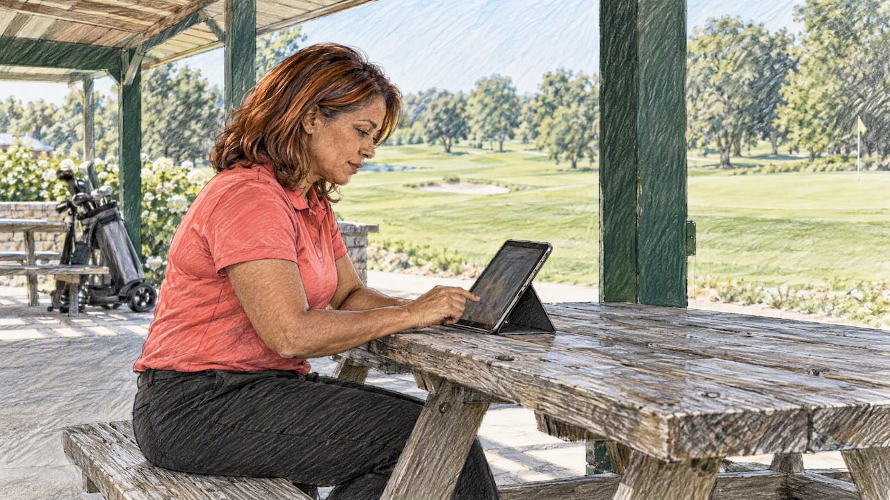 Secretary entering tee times beside course